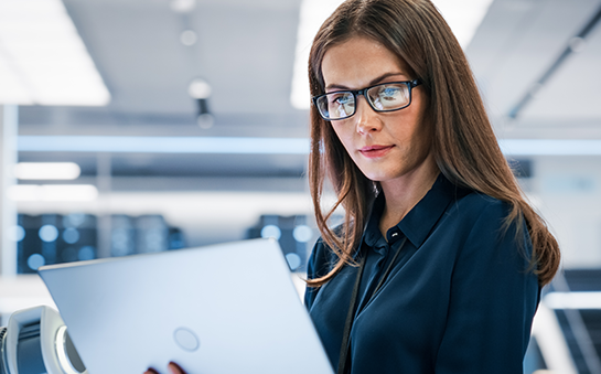 Business woman working on computer.