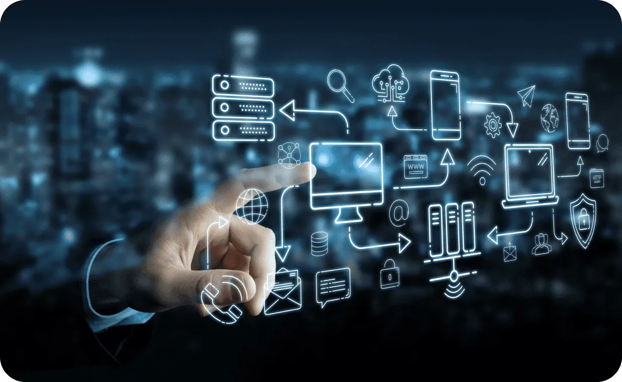 Hand pointing at a futuristic digital interface with connected icons of servers, cloud, devices and networks over city lights.